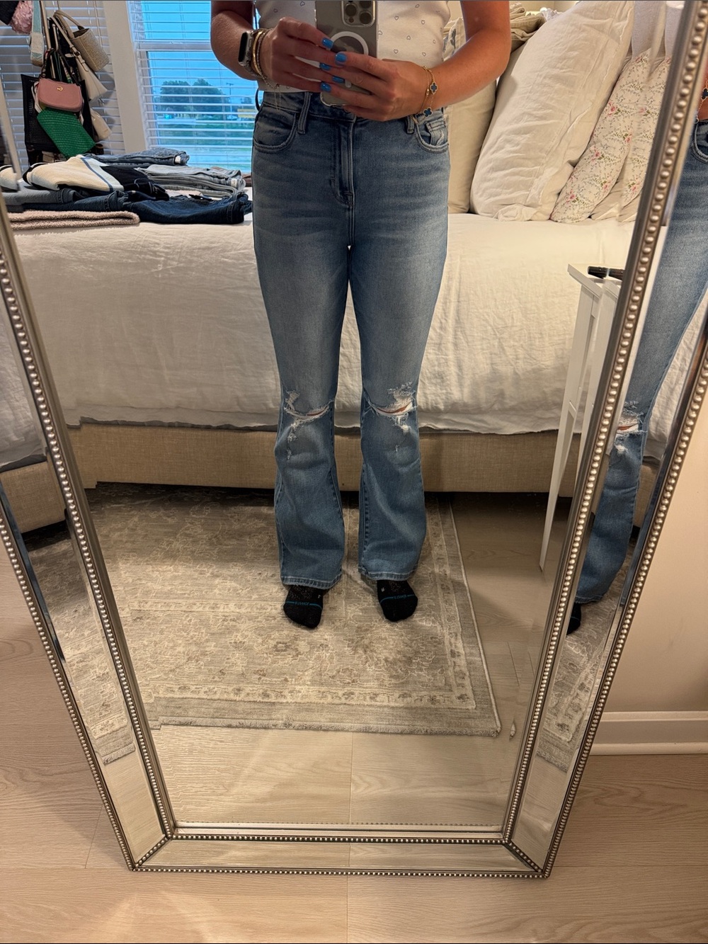High-Rise Distressed Flare Jeans in Light Blue